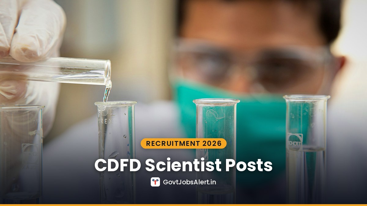 A scientist in a mask and goggles pouring liquid into a test tube in a laboratory — BRIC-CDFD Scientist Recruitment 2026