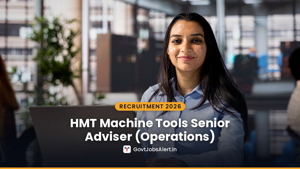 A professional woman at her office desk with a laptop - HMT Machine Tools Senior Adviser (Operations) Recruitment 2026