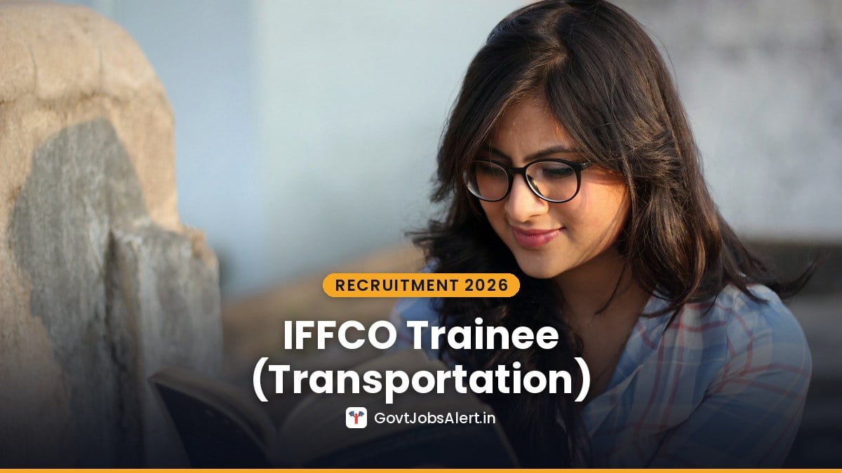 Young woman with glasses reading a book, preparing for IFFCO Trainee (Transportation) Recruitment 2026 at Aonla Unit, Bareilly