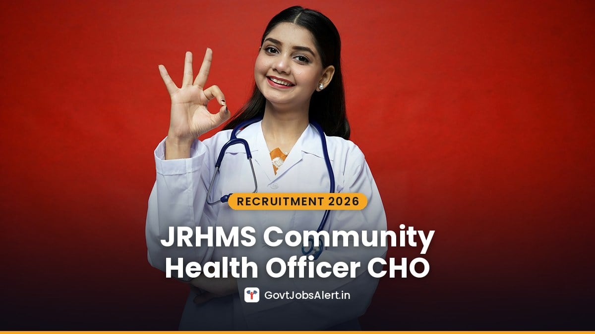 A smiling Indian health worker in a white coat with a stethoscope - JRHMS Community Health Officer Recruitment 2026