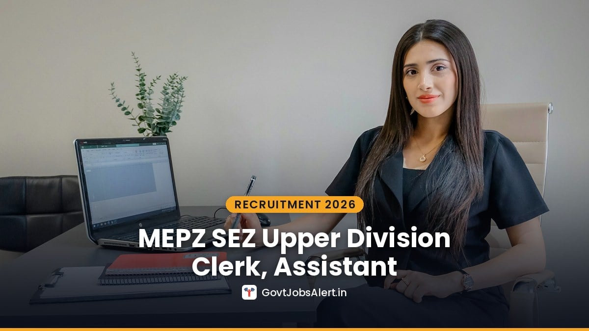 Woman working at an office desk with a laptop for MEPZ SEZ Upper Division Clerk, Assistant and Other Posts Deputation Recruitment 2026
