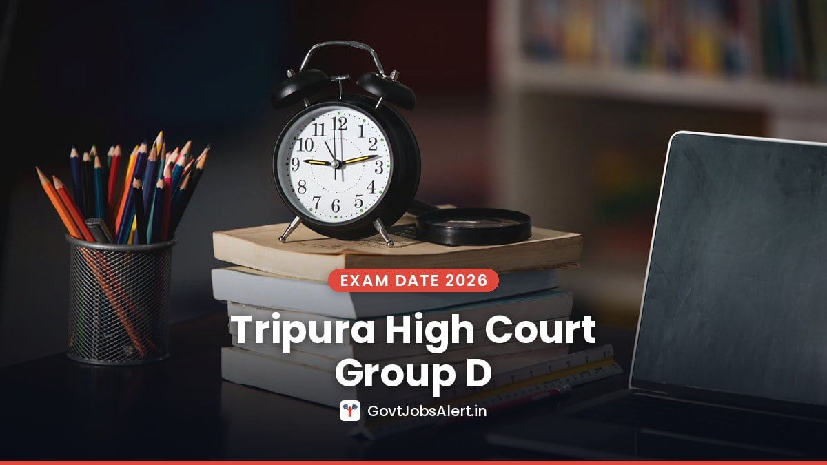 Alarm clock on books beside pencils and a laptop on a study desk for Tripura High Court Group D Exam Date 2026