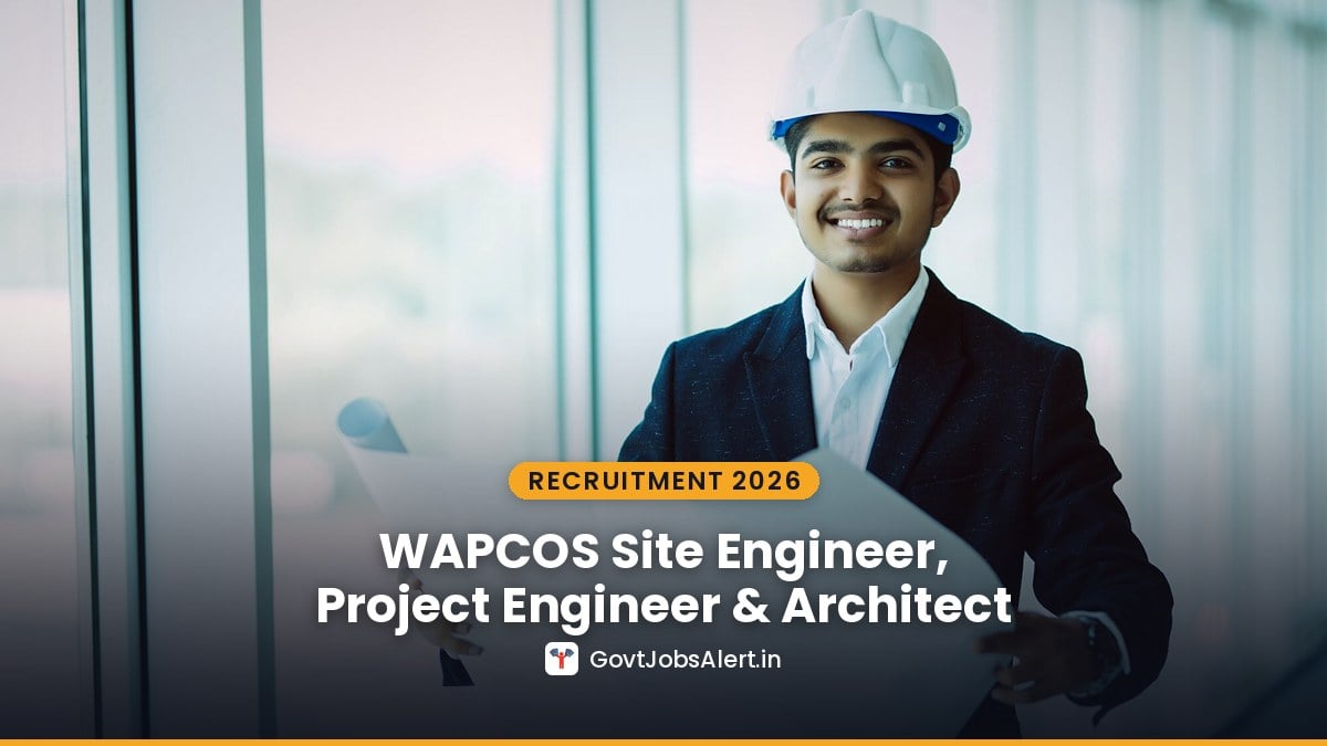 An Indian engineer in a hard hat holding building plans — WAPCOS Site Engineer, Project Engineer and Architect Recruitment 2026
