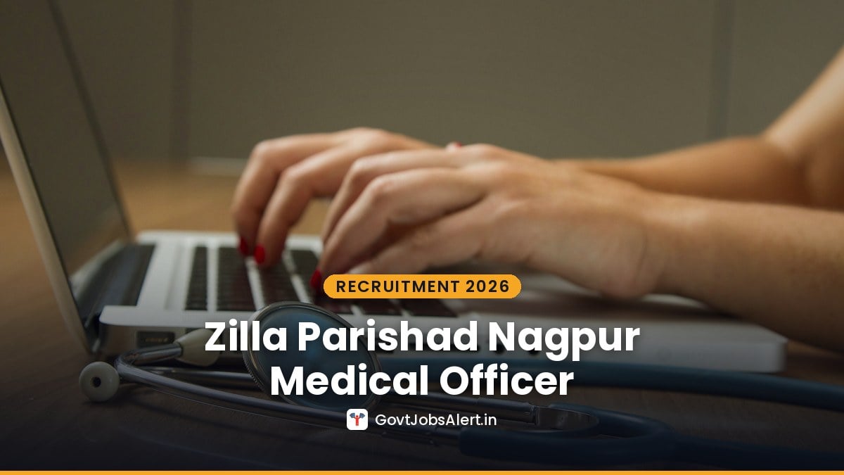 A doctor's hands typing on a laptop beside a stethoscope — ZP Nagpur Ad hoc Medical Officer (BAMS) Recruitment 2026